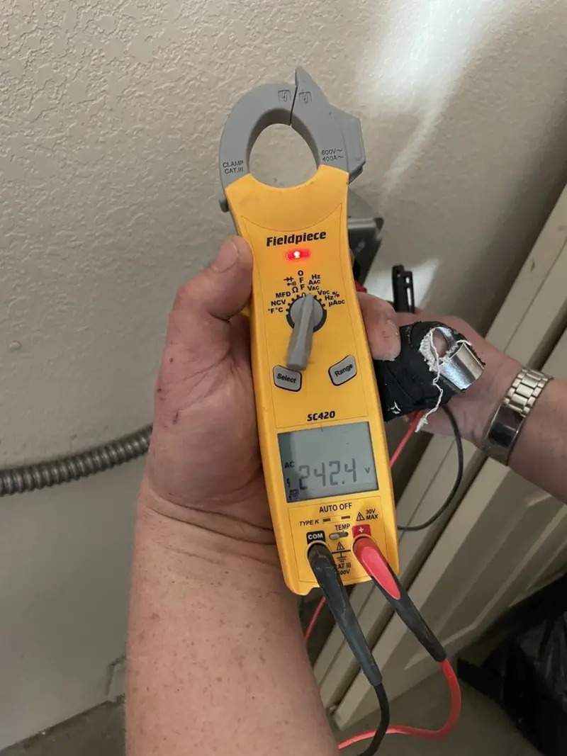 Voltage testing with clamp meter during Hot Tub / Pool Electrical Wiring in Narragansett